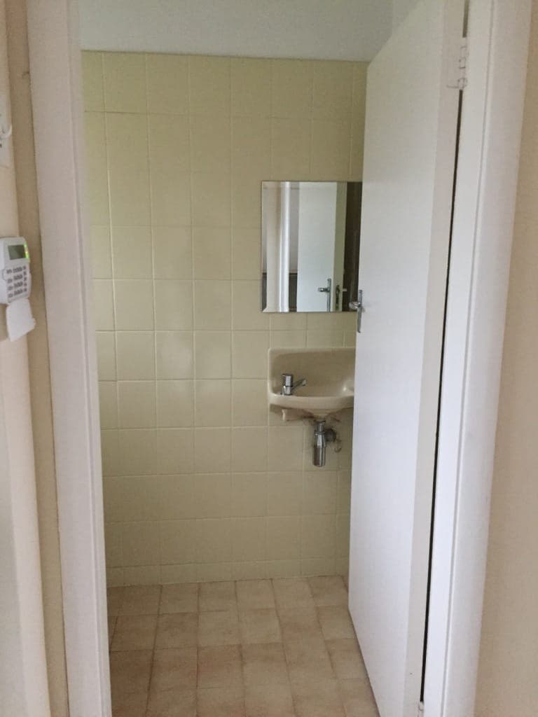Guest cloakroom before