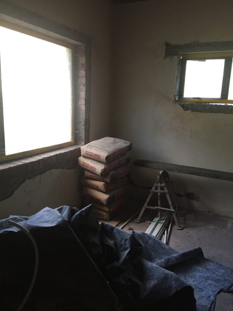 Down to brick before the first fix