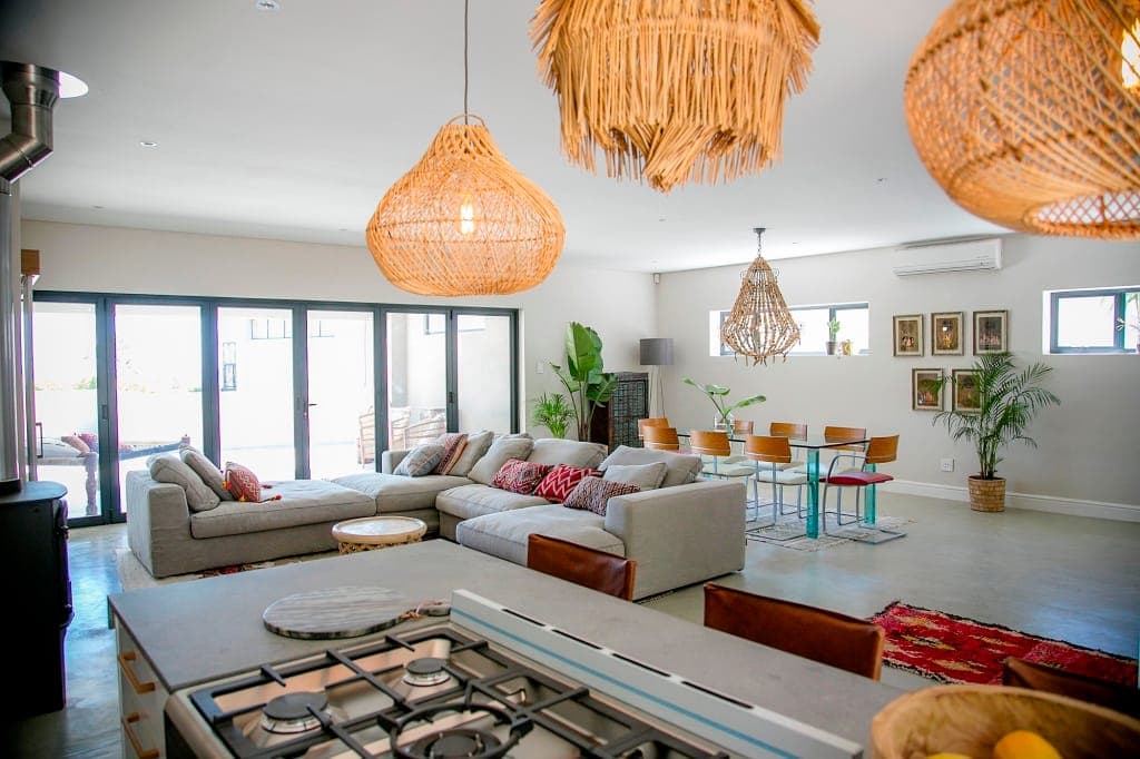 Open-plan kitchen, lounge and dining after the renovation